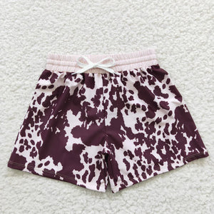 Cow Print Swim Trunks